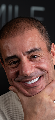 Happy patient after a Hollywood smile treatment in Turkey with Dentique Clinic